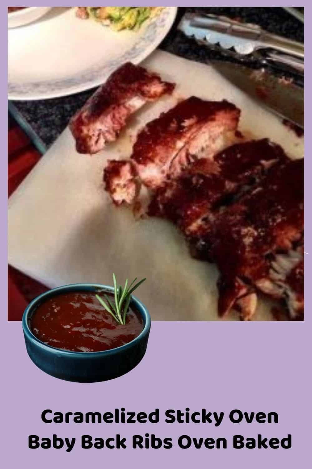 an image of Sticky Oven Baby Back Ribs on a white platter with a side of salad