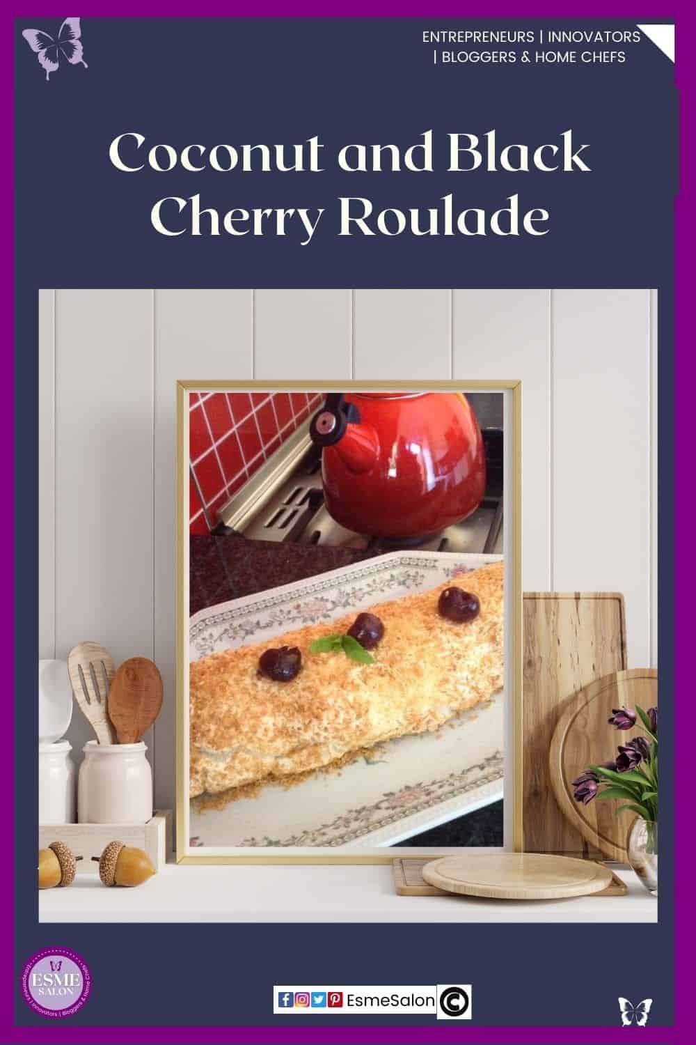 an image of a Coconut Roulade un a white plate with Black Cherries in the middle as well as on top
