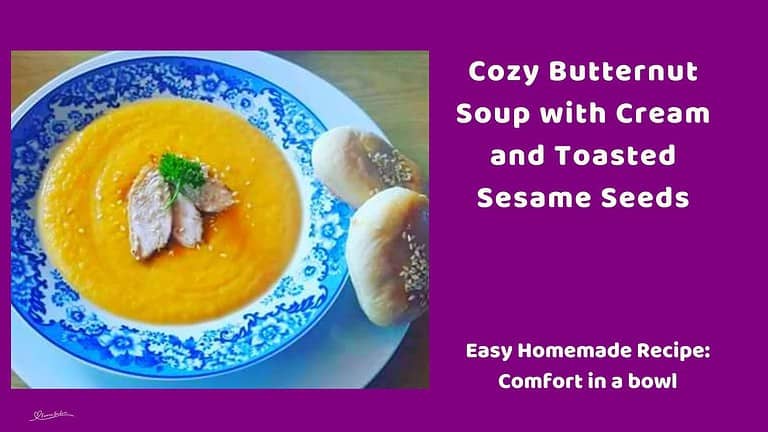 an image of a soup bowl with Butternut Soup with Sesame Seeds and bread on the side
