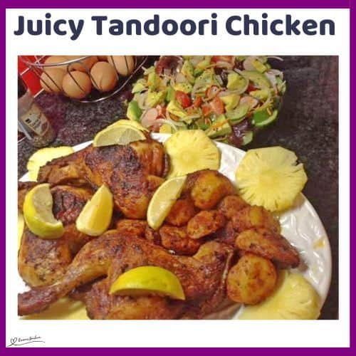 an image of a white platter with Juicy Tandoori Chicken, pineapple and lemon slices