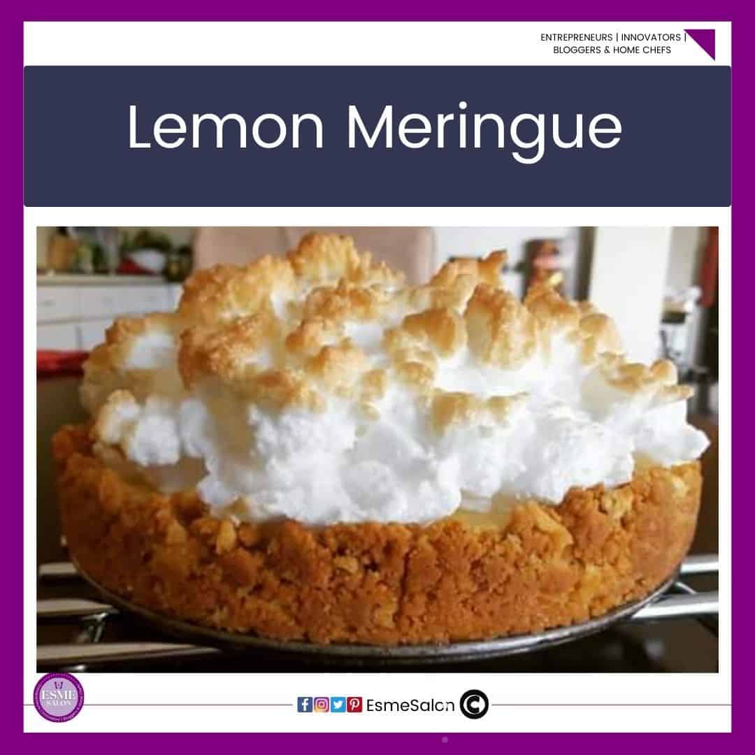 an image of a Lemon Meringue pie with cookie crust and a high pile of meringue