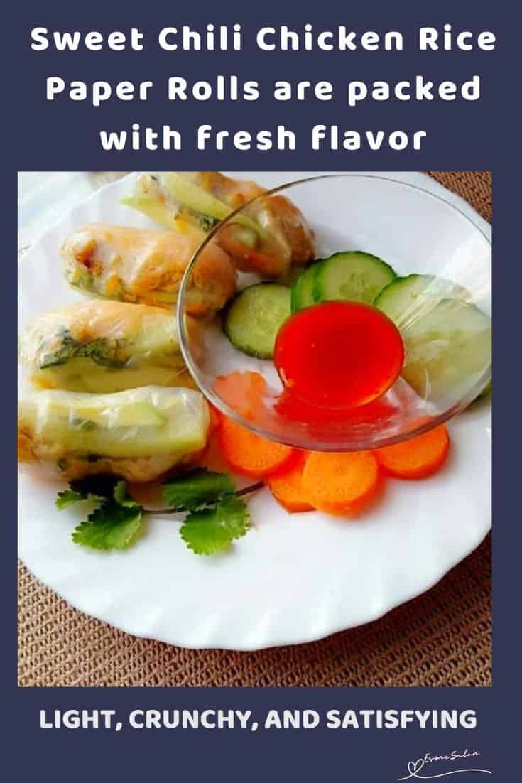 an image of Sweet Chili Chicken Rice Paper Rolls with veggies on the side on a white dinner plate