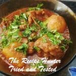Mutton Curry made with knuckles and neck meat with curry, chili, potato and yoghurt