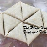 Cheese and Sweetcorn Samoosa triangles ready for baking