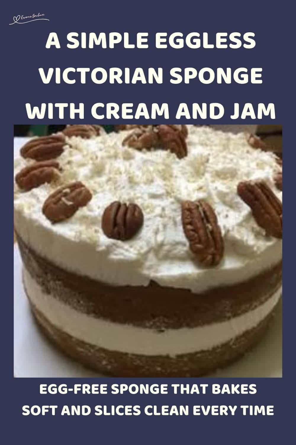 an image of a double layer Simple Eggless Victorian Sponge with cream and nuts