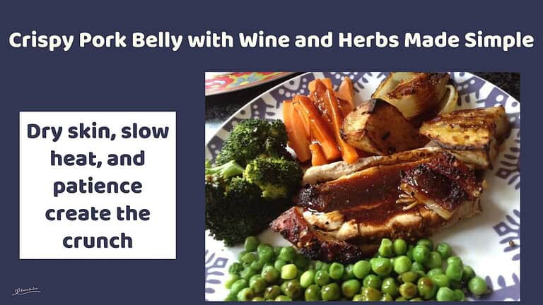 An image of Pork Belly with Wine and Herbs with broccoli, green peas and carrots