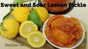 A tray with fresh lemon, and cut lemon with pickled lemon in a white bowl