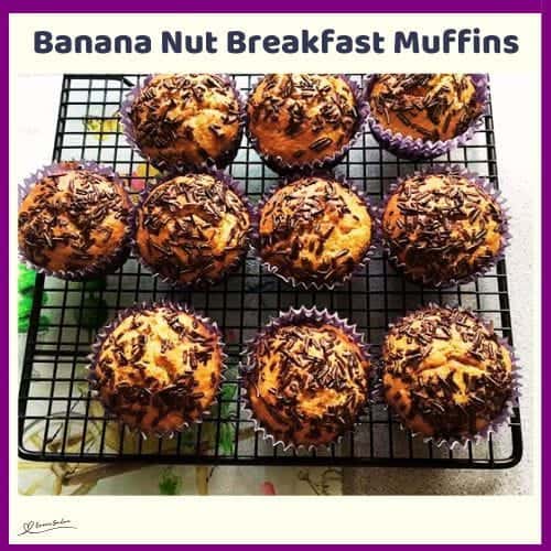 An image of 9 Banana Nut Breakfast Muffins covered with chocolate sprinkles