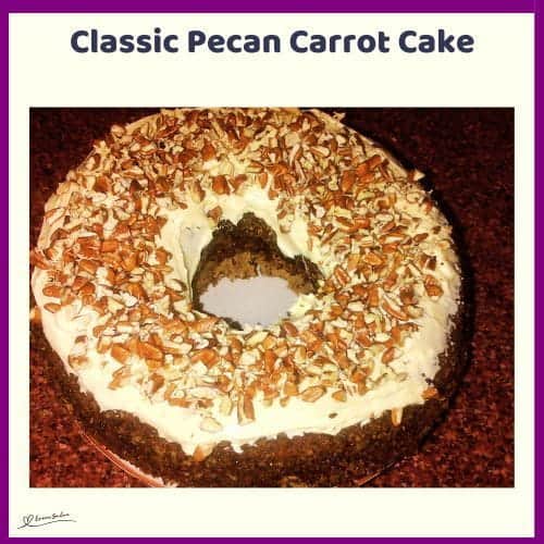 An image of a Classic Pecan Carrot Cake with cottage cheese icing and pecan nuts