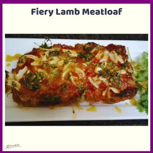 An image of a Fiery Lamb Meatloaf topped with caramelized sliced onion