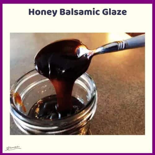 An image of a spoon dripping with Honey Balsamic Glaze into a Console jar