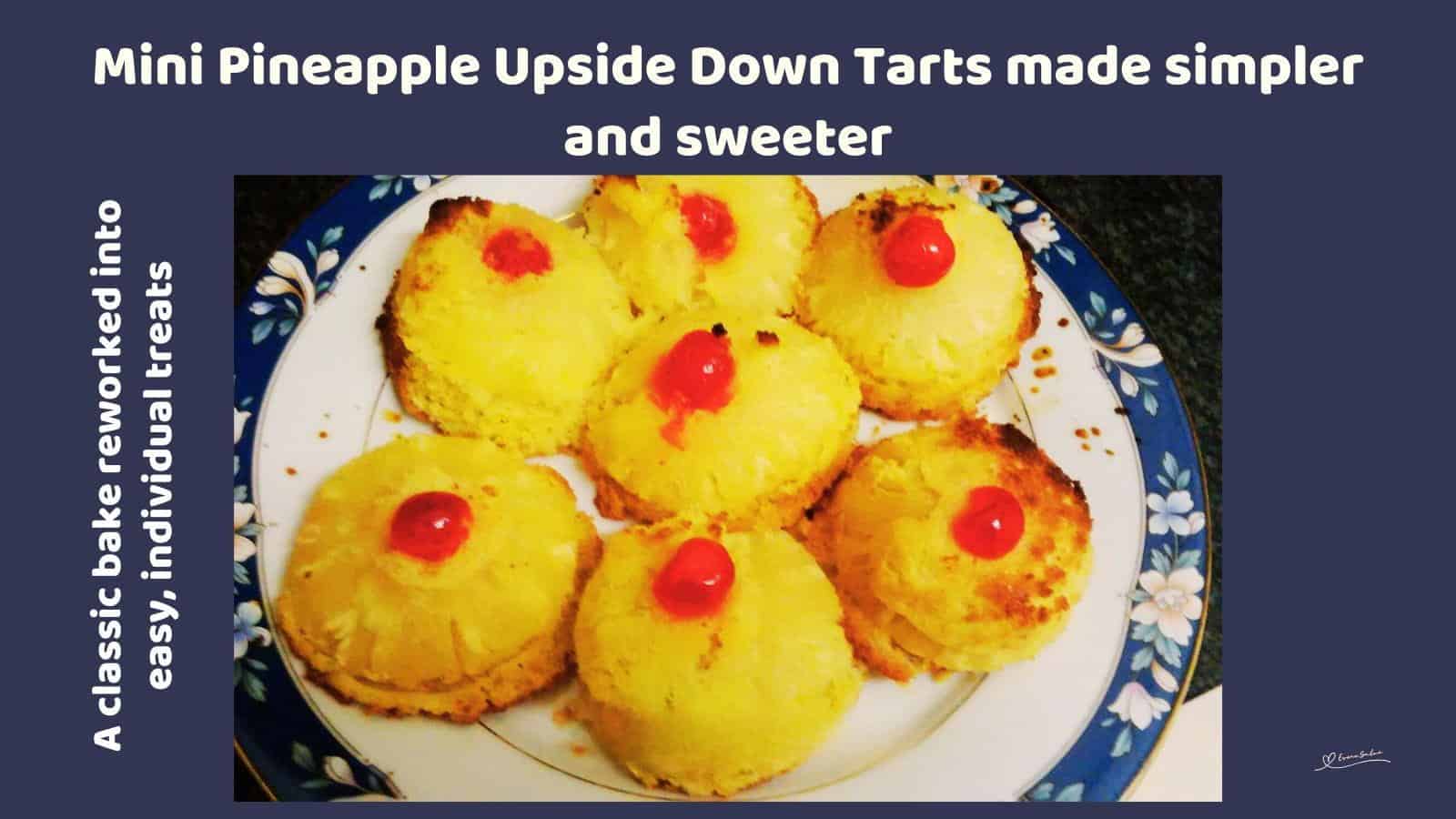 An image of a plate filled with Mini Pineapple Upside Down Tarts and a maraschino cherry in the center