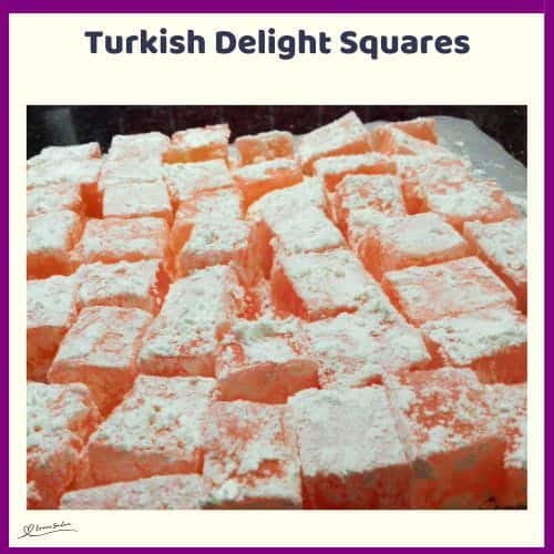 An image of Turkish Delight Squares dusted with icing sugar