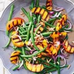 Chargrilled peaches with green beans and almonds