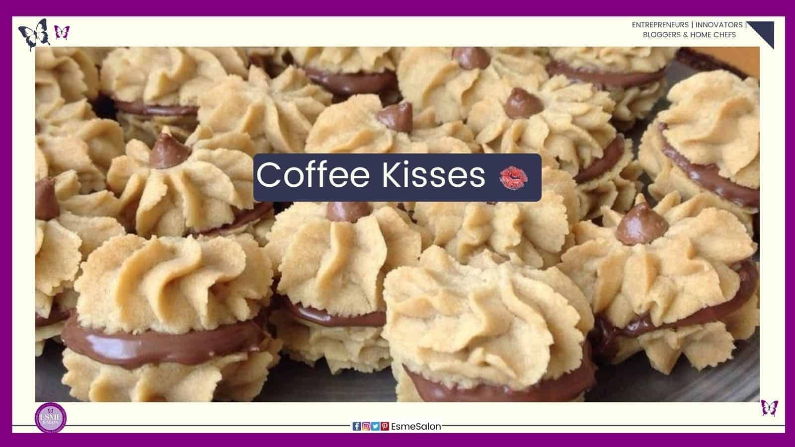 an image of a batch of Coffee Kisses cookies with chocolate filling and stacked together