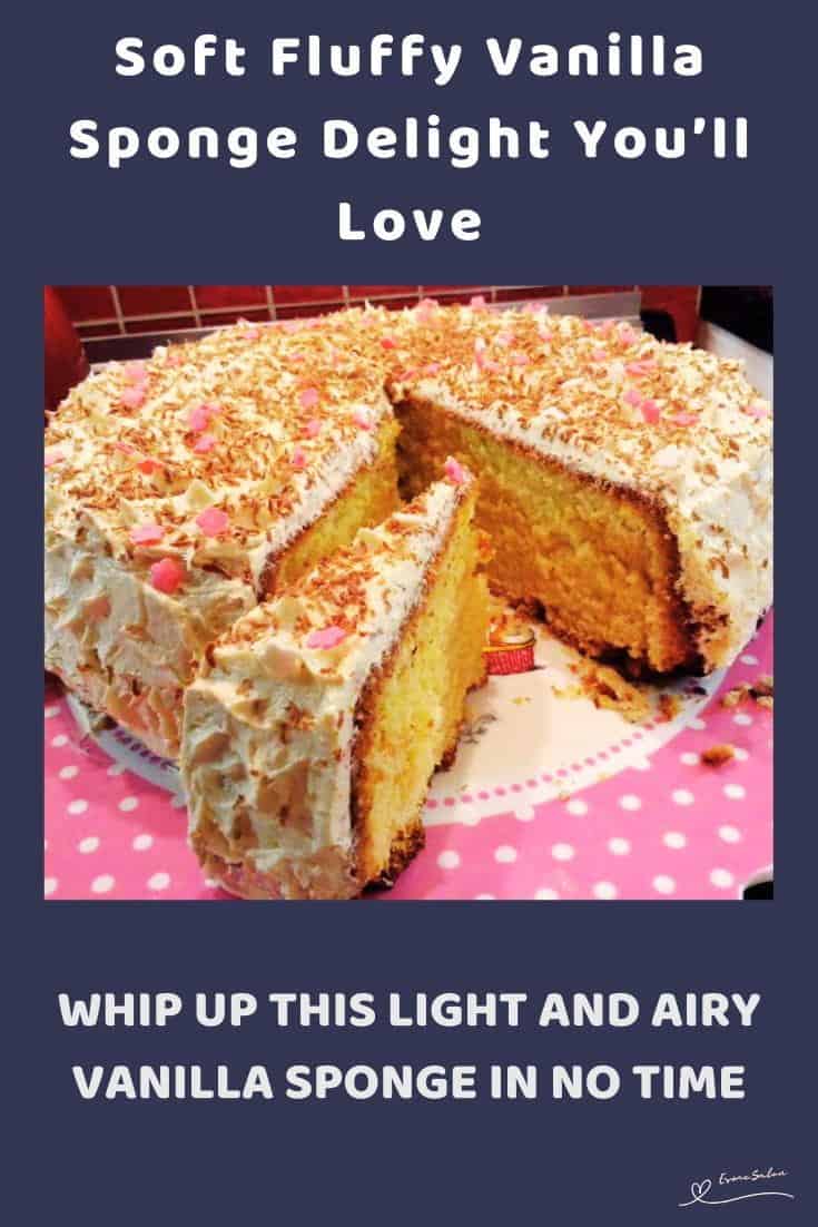 An image of a Fluffy Vanilla Sponge Cake Delight decorated with frosting and sprinkles