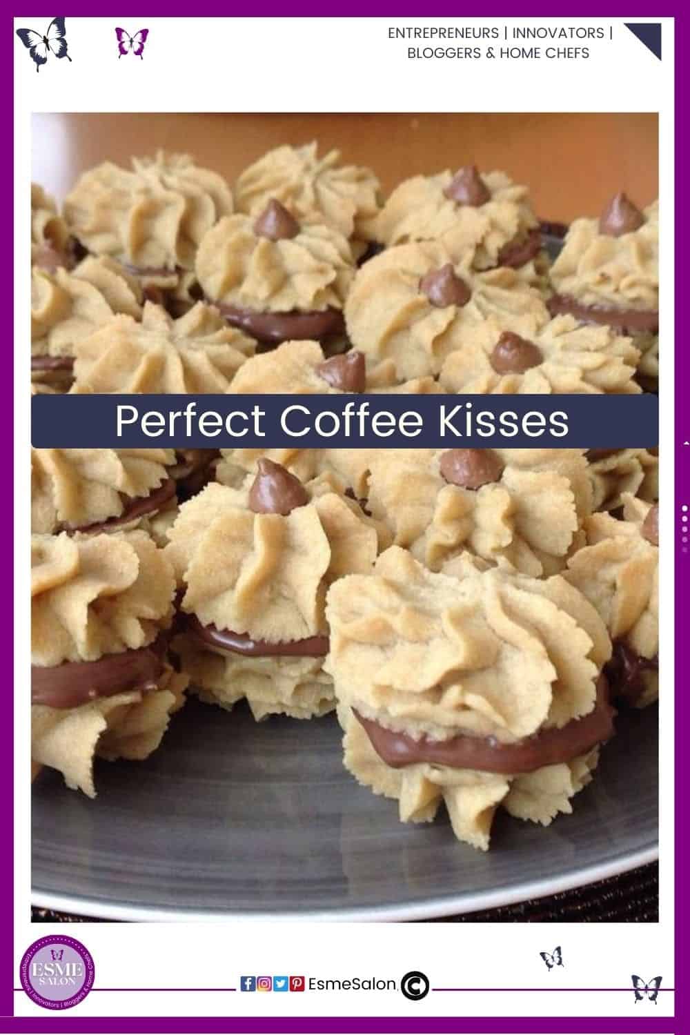 an image of a batch of Coffee Kisses cookies with chocolate filling and stacked together