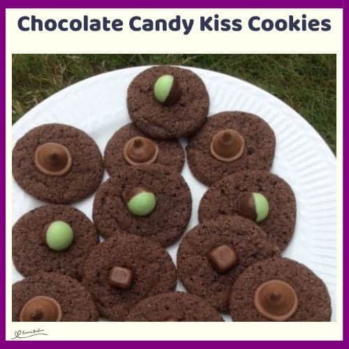 An image of a Chocolate cookie with various mini chocolate as decoration