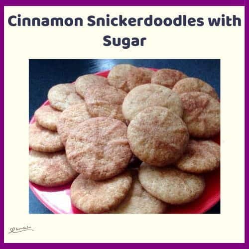 An image of a batch of round Classic Buttery Cinnamon Snickerdoodles on a red plate