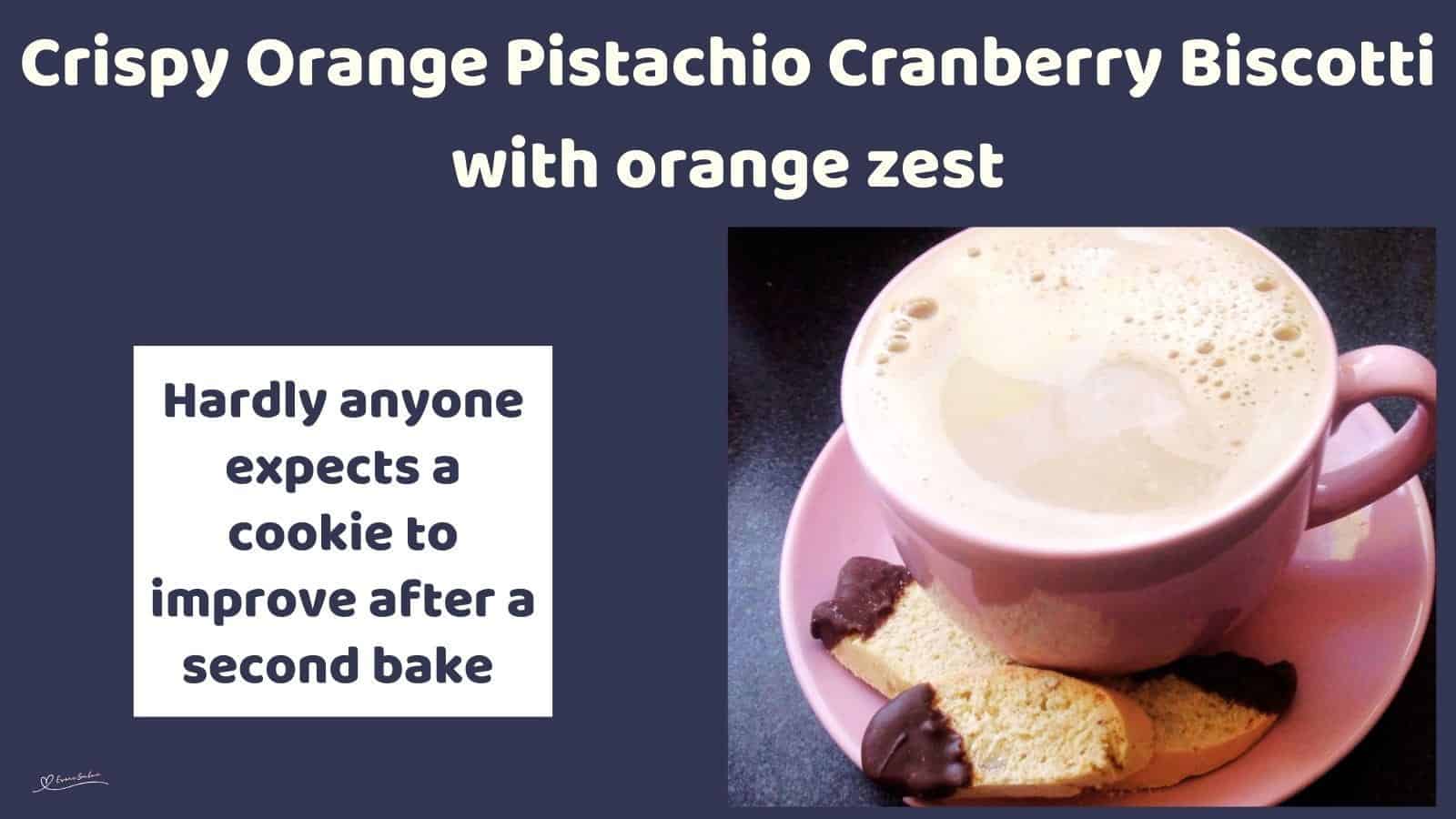 An image of slices of Crispy Orange Pistachio Cranberry Biscotti with tips dipped in chocolate