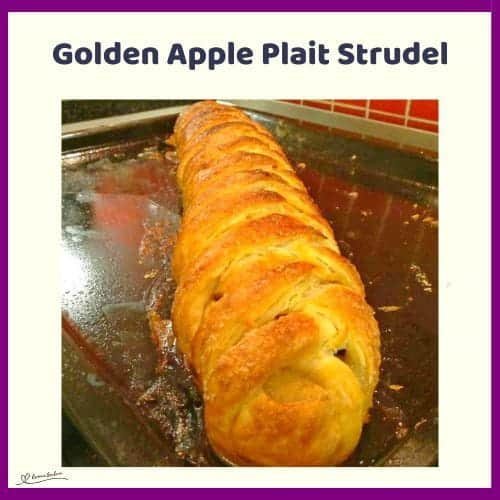 An image of a Golden Apple Plait Strudel with raisins and red apple filling