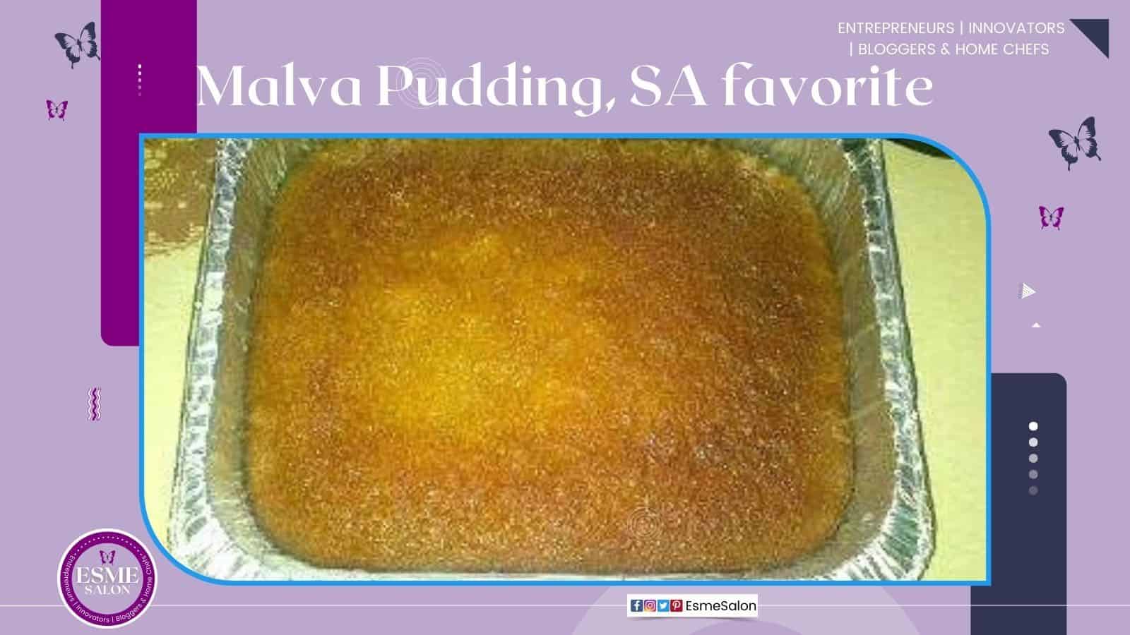 An image of a brown baked pudding with rich creamy sauce that seeped into the dough