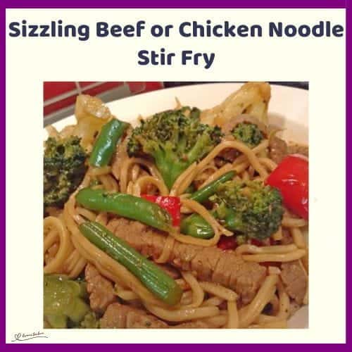 An image of a plate of Sizzling Beef or Chicken Noodle Stir Fry