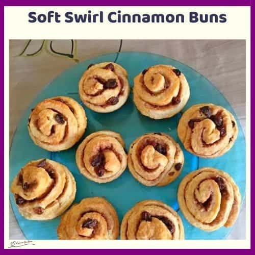 An image of Soft Swirl Cinnamon Buns on a blue platter