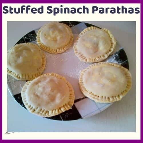 An image of Stuffed Spinach Parathas in the making, stuffing and raw dough