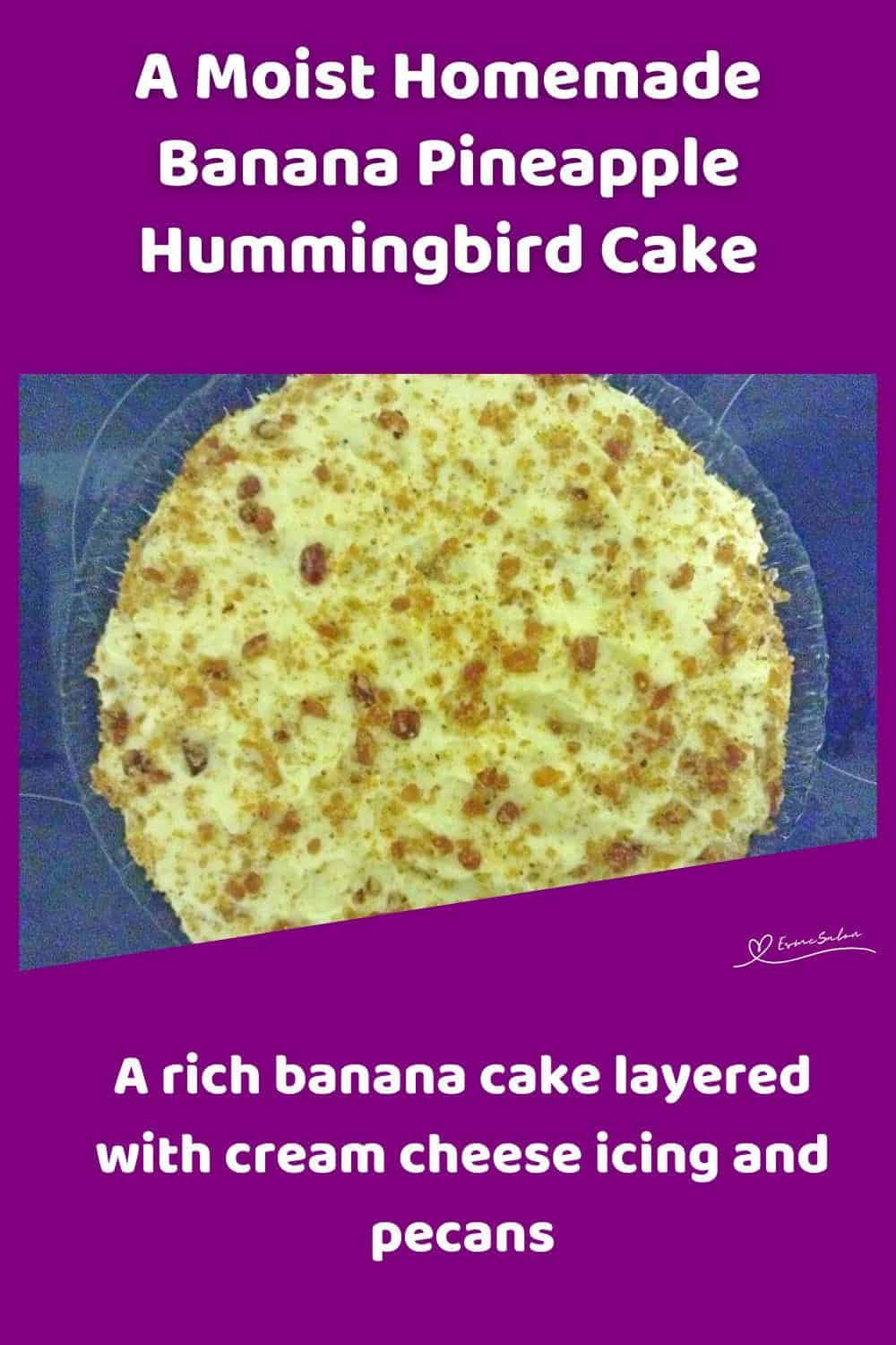 An image of a round Banana Pineapple Hummingbird Cake with pineapple, banana and pecan brittle