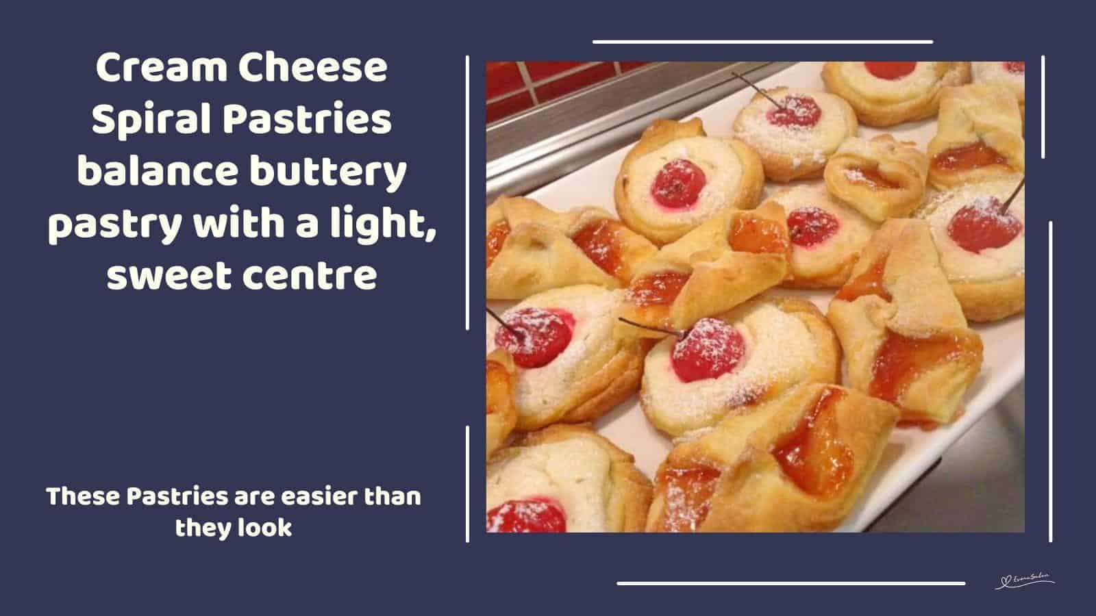 An image of a batch of Cream Cheese Spiral Pastries dotted with cherries or jam