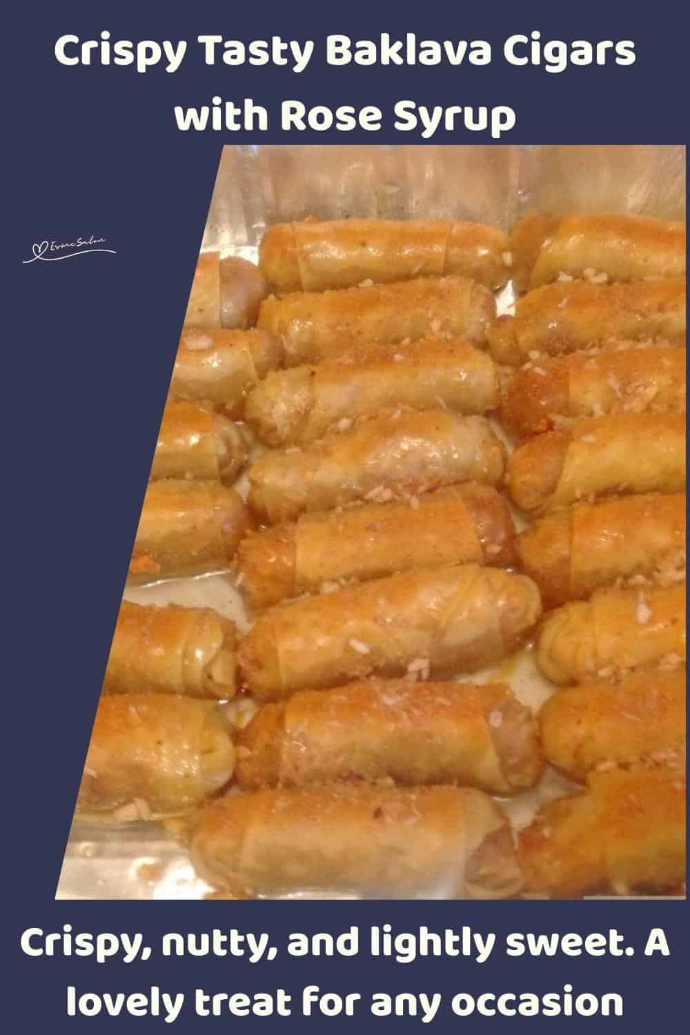 An image of Baklava Cigars with Rose Syrup in a tinfoil pan