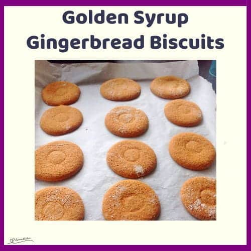 An image of 12 Golden Syrup Gingerbread Biscuits on a baking tray