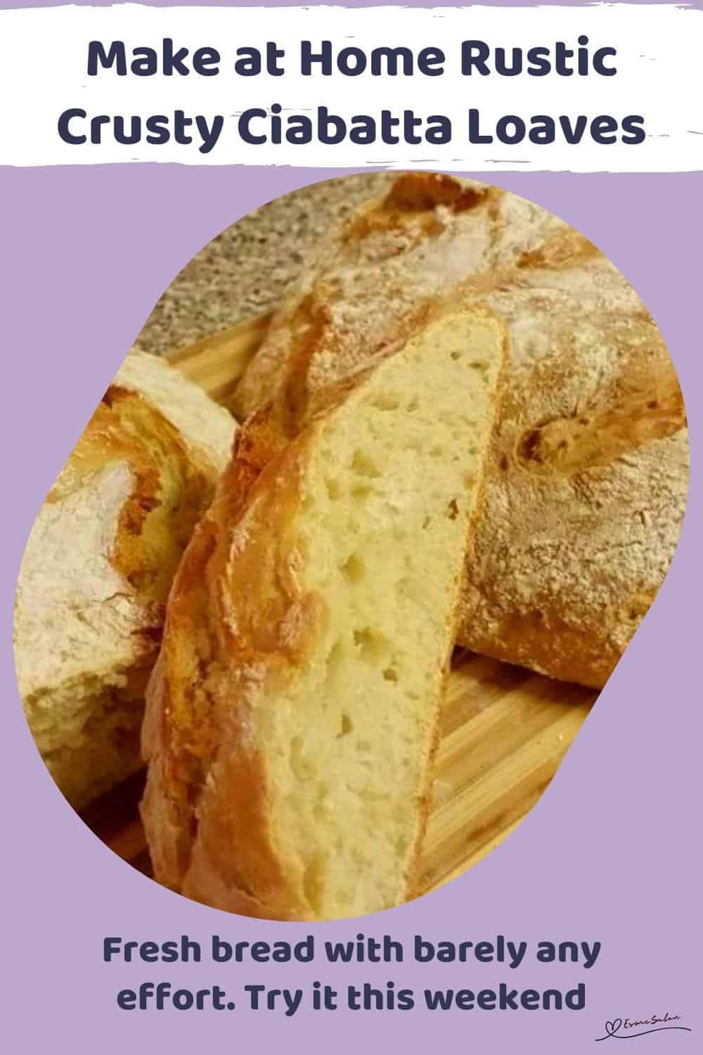 An image of 2 Rustic Crusty Ciabatta Loaves on a wooden cutting board