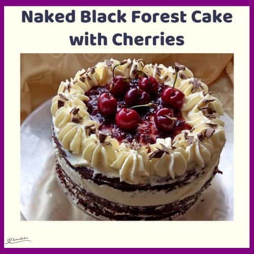 An image of a Naked Black Forest Cake with Cherries and Cream Rosettes
