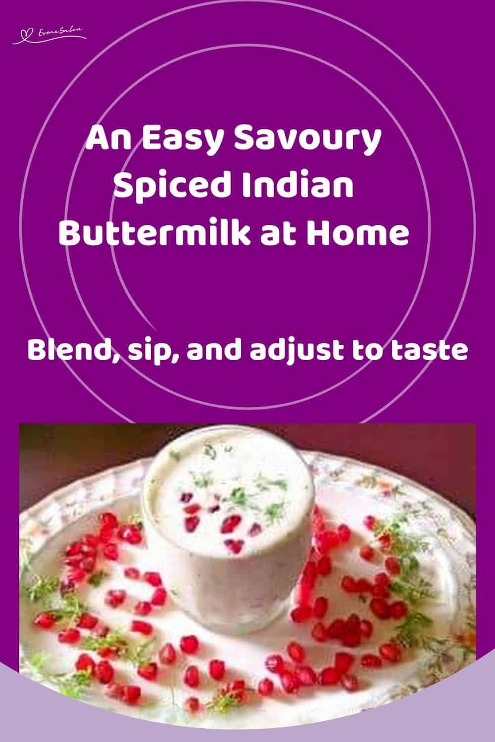 An image of a glass with Spiced Indian Buttermilk and garnishes with fresh coriander leaves, pomegranate seeds