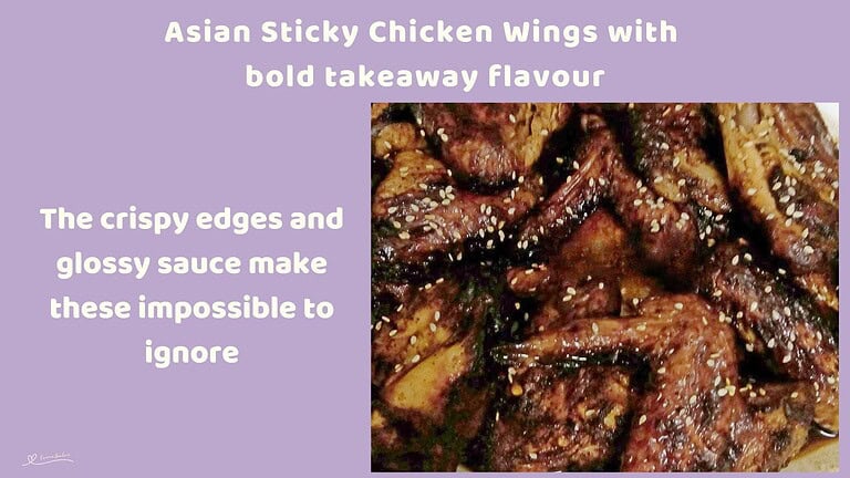 An image of a plate filled with Asian Sticky Chicken Wings sprinkled with sesame seed