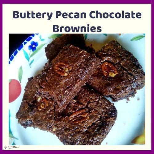 An image of Chocolate Brownies with a pecan on each block
