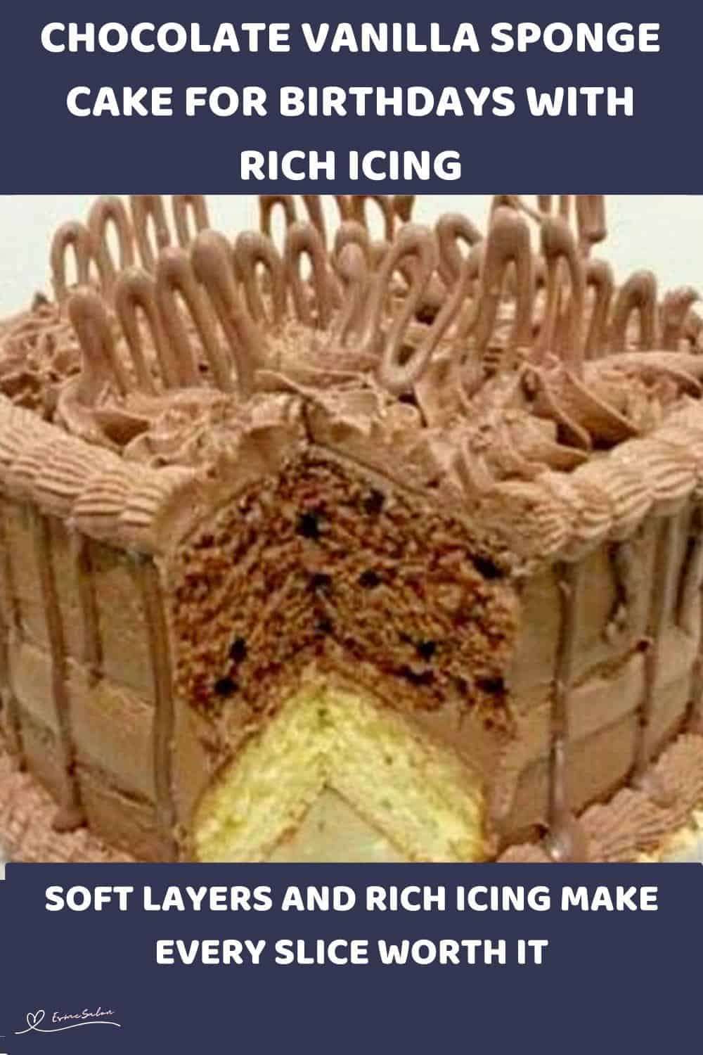 An image of a heart shaped Chocolate Vanilla Sponge Cake with rich chocolate icing