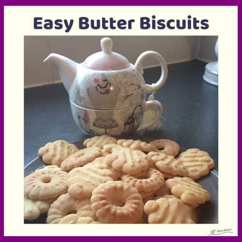 An image of a batch of Easy Butter Biscuits next to a fancy teapot