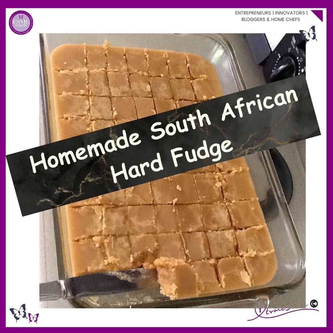 an image of a oblong Pyrex dish with Homemade South African Hard Fudge cut into cubes and ready to be enjoyed.