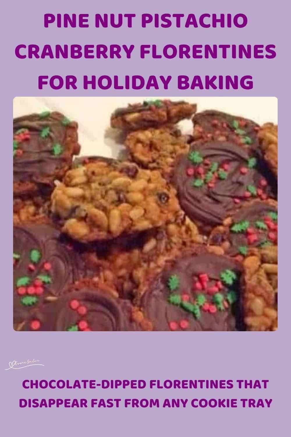 An image of a stack of Pine Nut Pistachio Cranberry Florentines with chocolate bottoms and fancy Christmas Sprinkles
