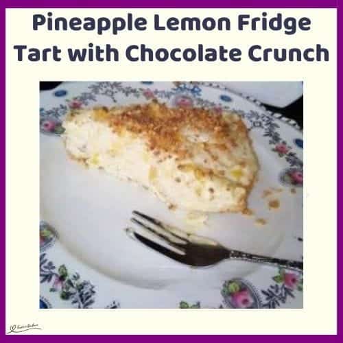 An image of a slice of Pineapple Lemon Fridge Tart with Chocolate Crunch on a floral plate with a dessert fork