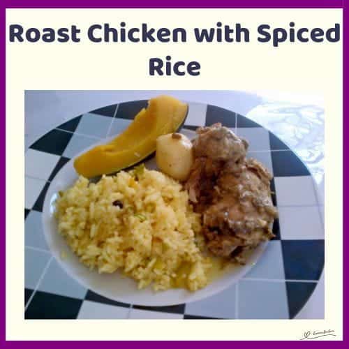 An image of a plate of Roast Chicken with Spiced Rice with a side of veggies