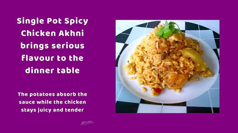 An image of a plate piled high with Spicy Chicken Akhni