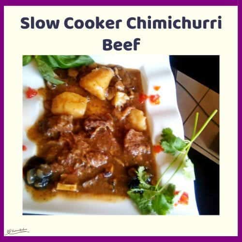 An image of a white platter with Slow Cooker Chimichurri Beef with potatoes and veg