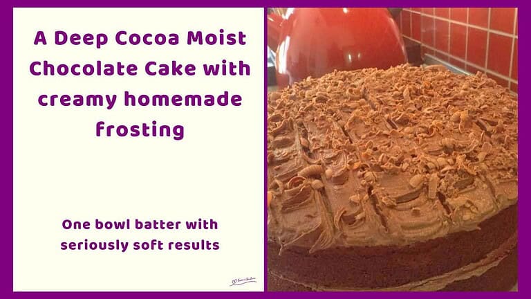 An image of a double-layer Chocolate Cake with Chocolate Buttercream Icing and grated milk chocolate