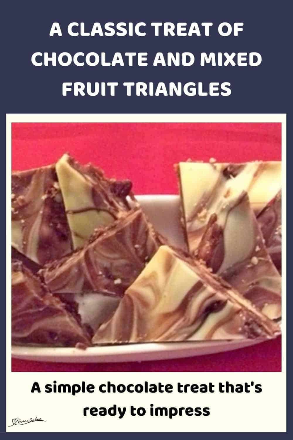 An image of Chocolate and Mixed Fruit Triangles with biscuit pieces and studded with dried fruit
