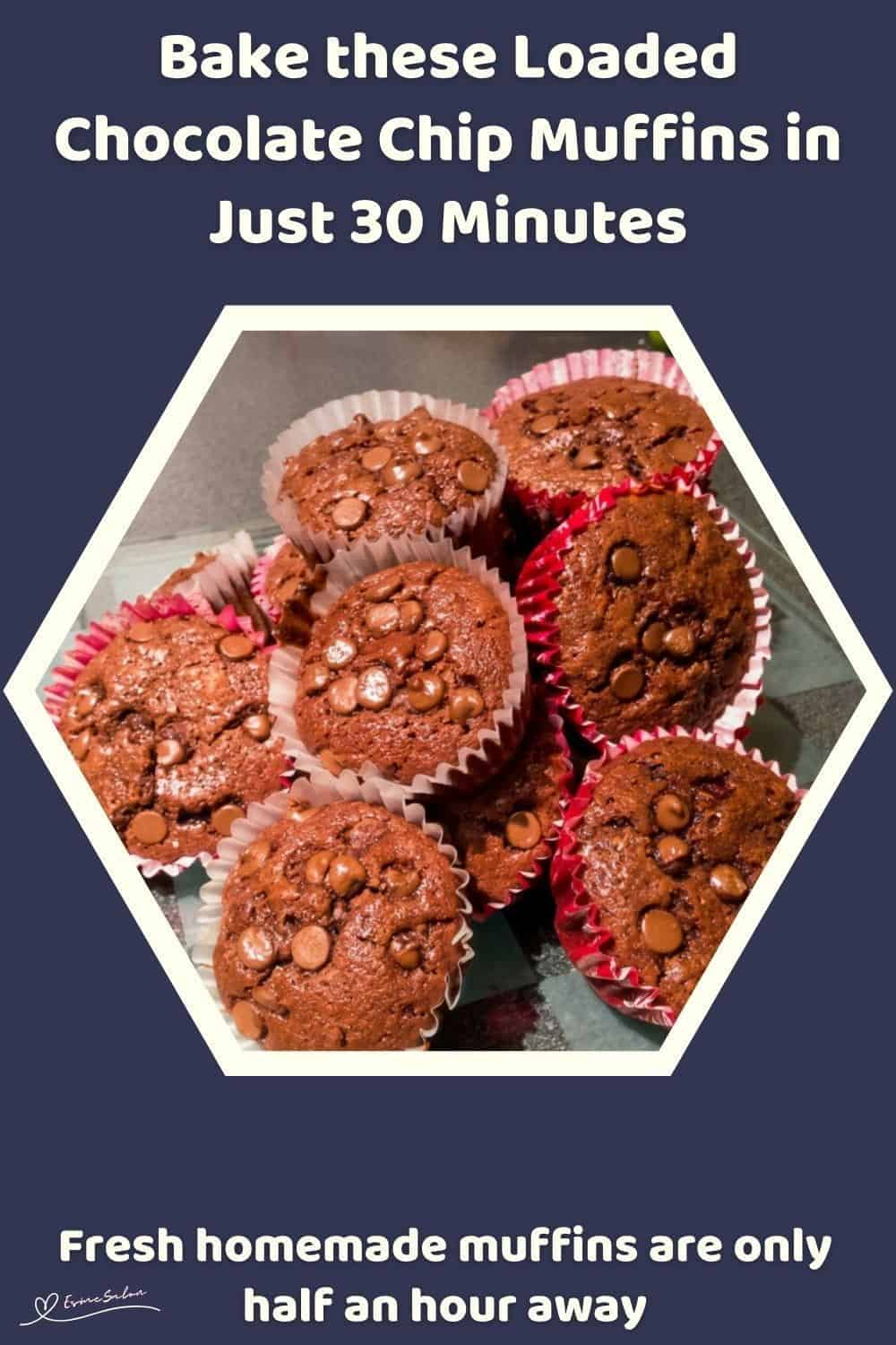 An image of Chocolate Chip Muffins in cupcake paper holders and decorated with chocolate chips