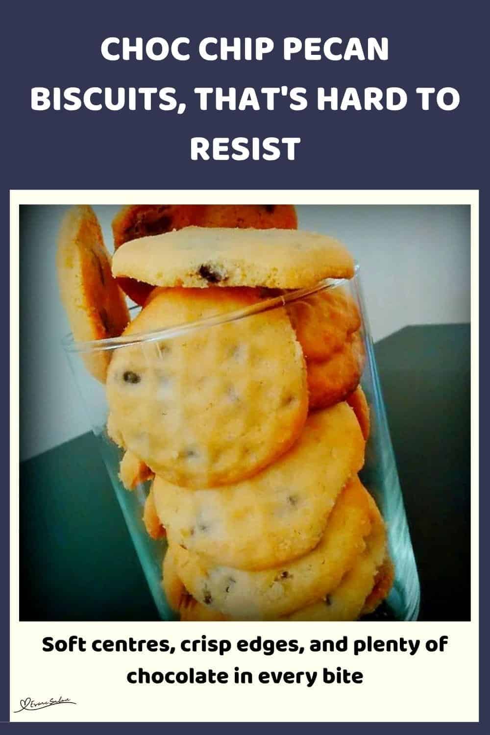 An image of Choc Chip Pecan Biscuits stacked in a glass